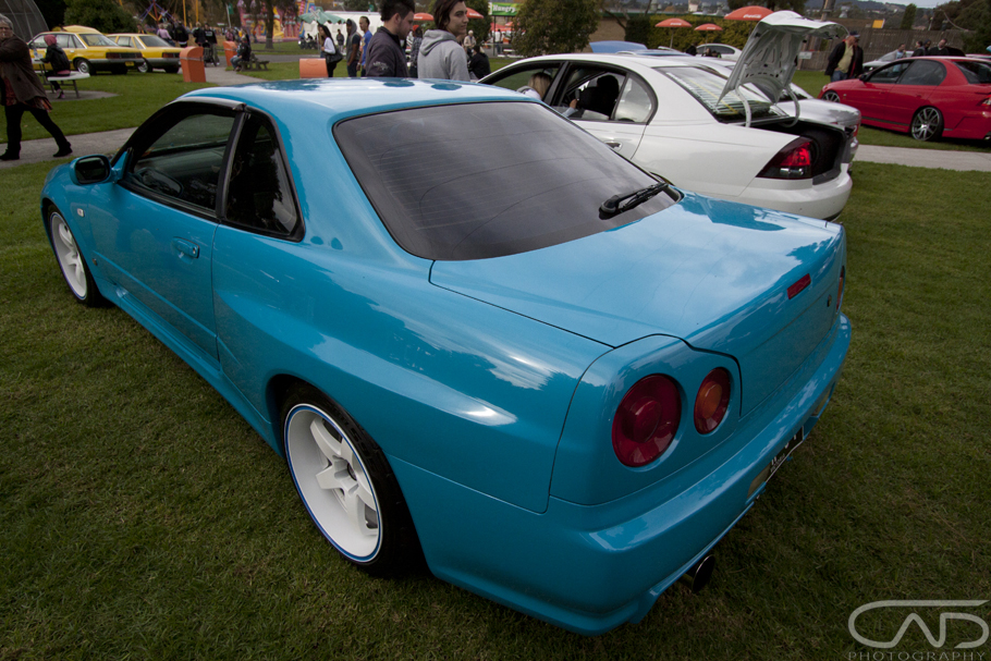 Teal Blue R34 Skyline on White Rims 2